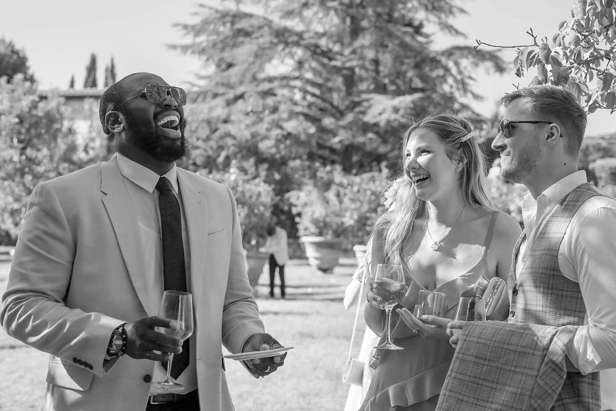 laughing guests at an Italy wedding