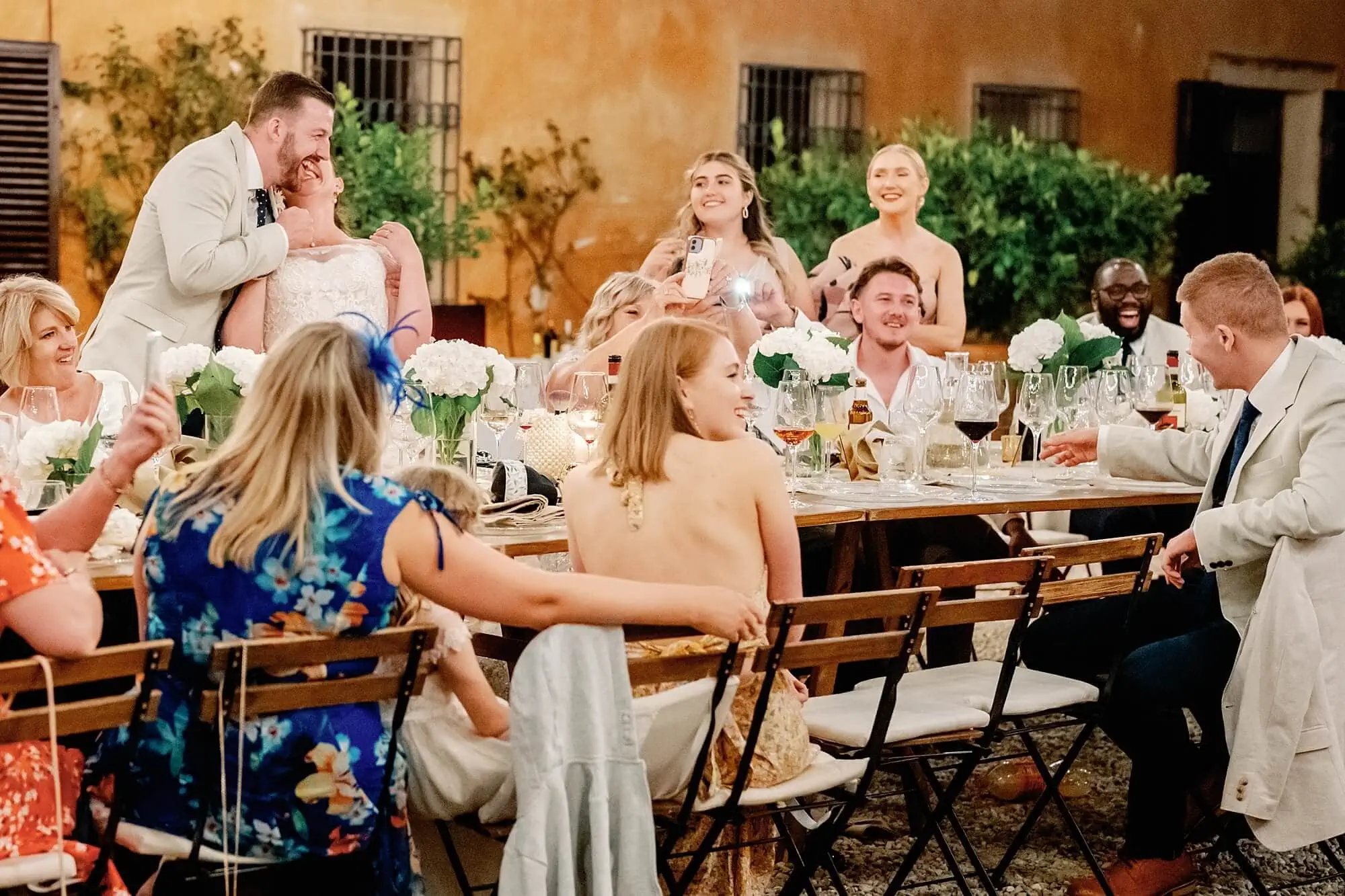 bride and groom's reaction to the bridesmaids speech in Tuscany