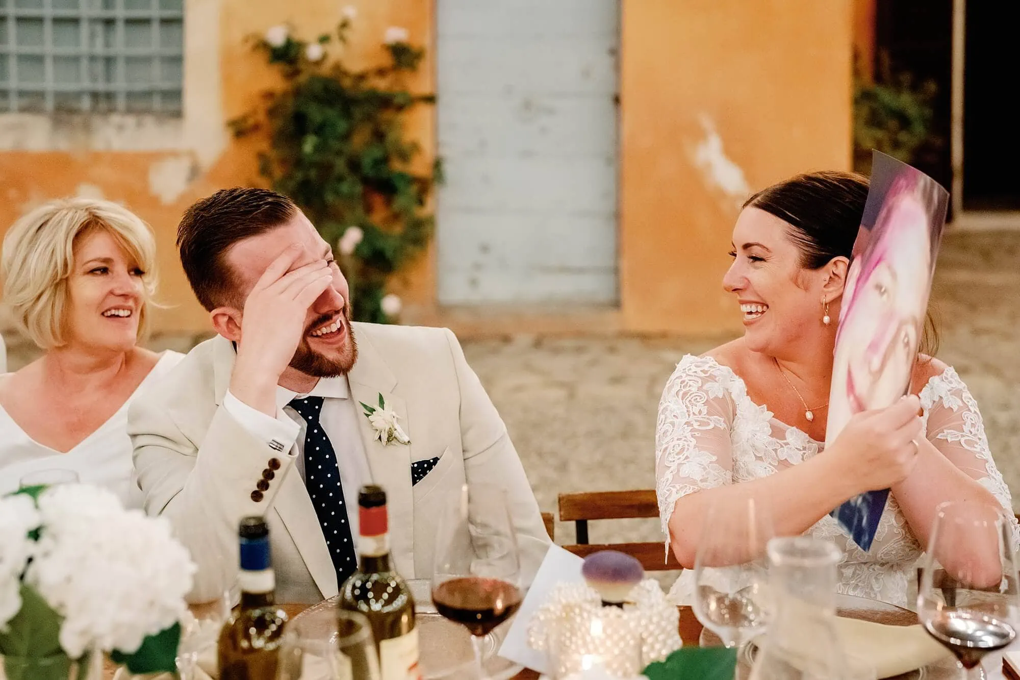 Groom stunned by photo during the best man's speech in Tuscany
