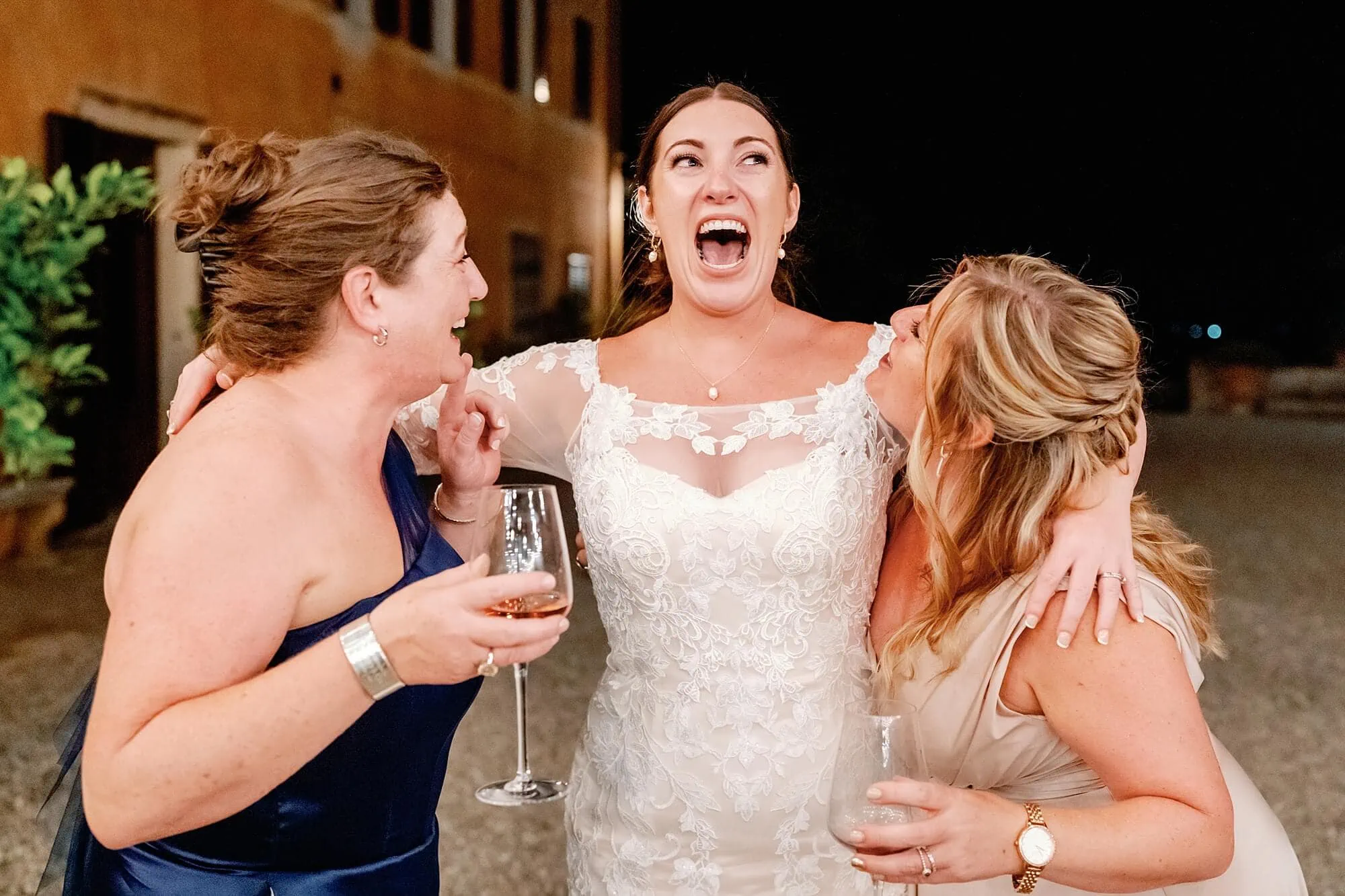 happy bride and sisters after the speech in Tuscany