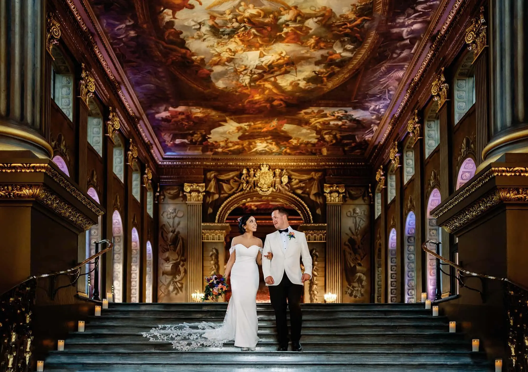Couple walking out of The Painted Hall