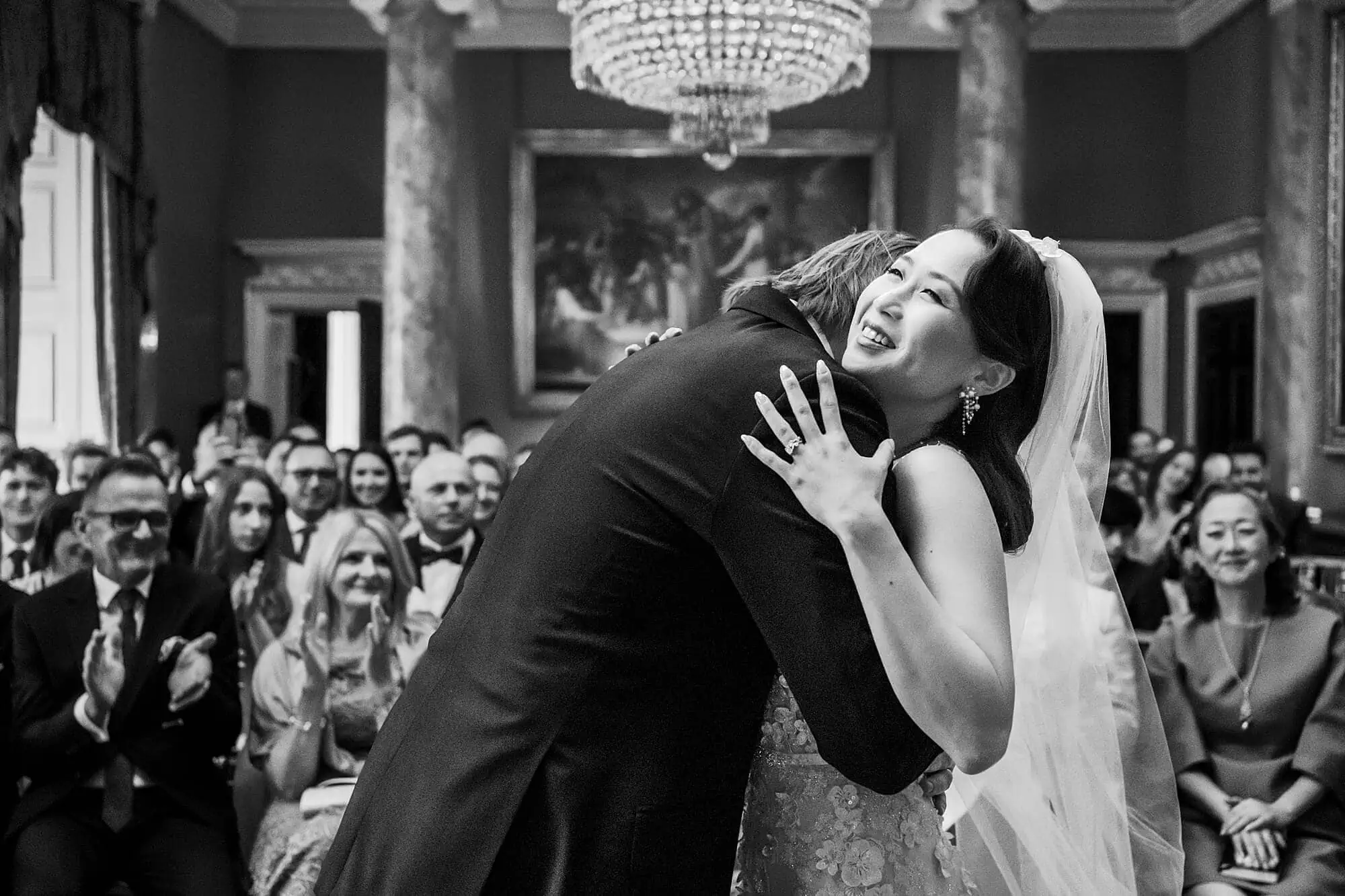The couple hug at Spencer House