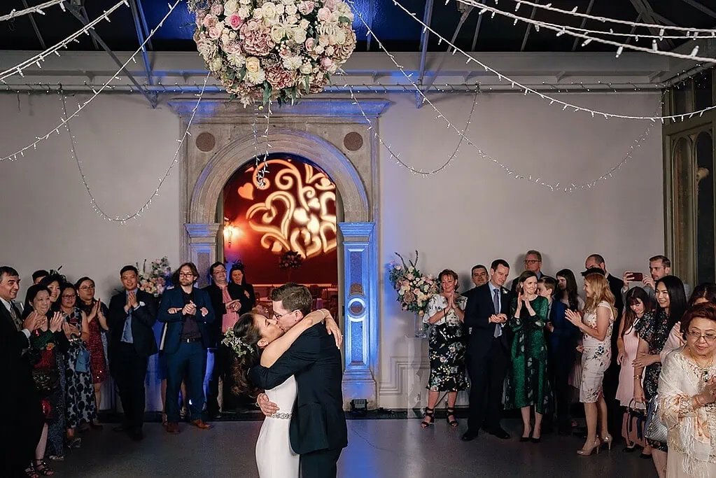 the first dance and kiss at the wedding
