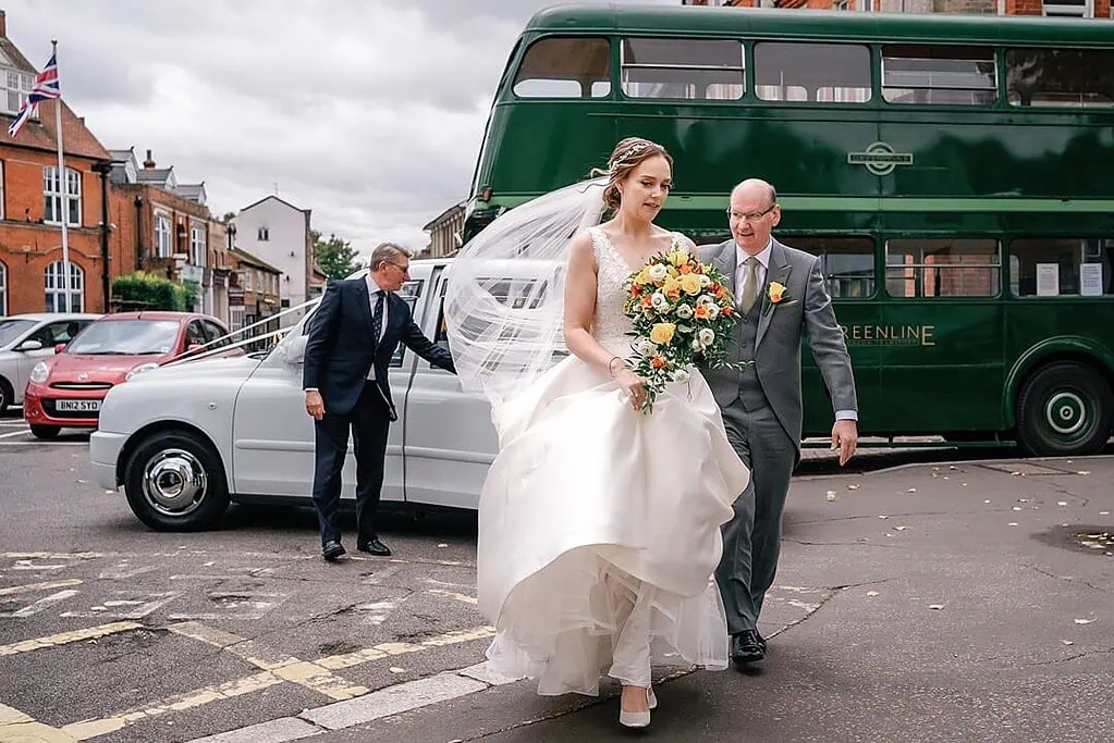 bride arriving at Waltham Abbey for the wedding ceremony