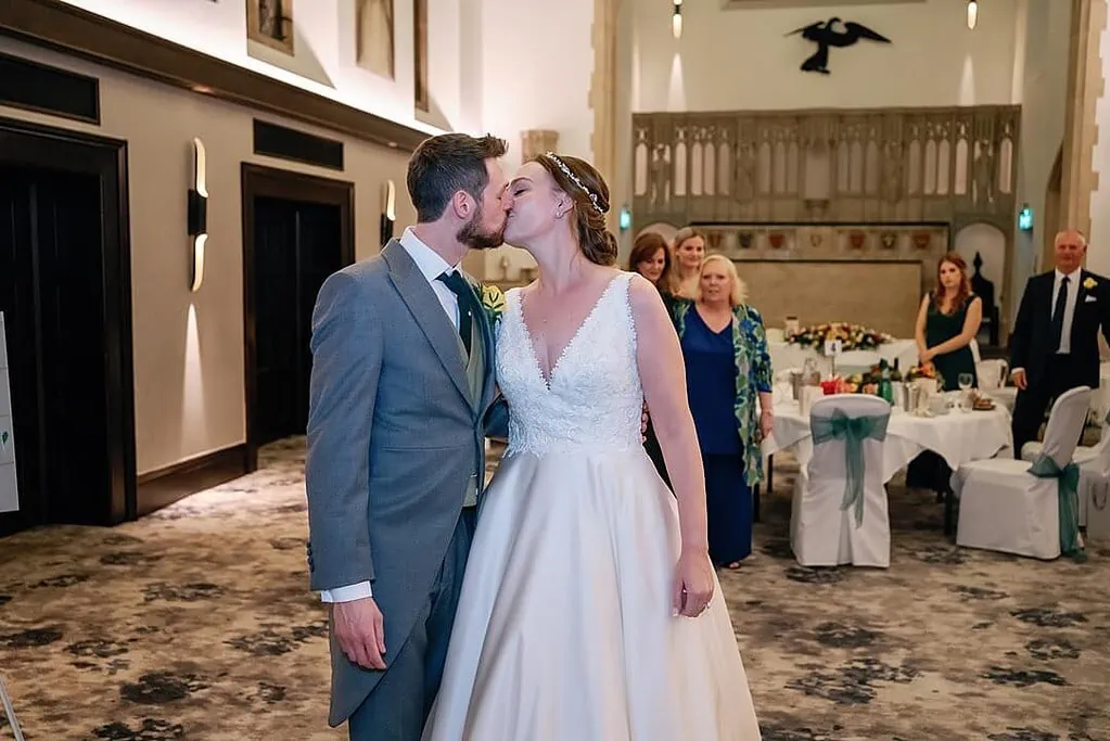 bride and groom kissing hanbury manor wedding photography