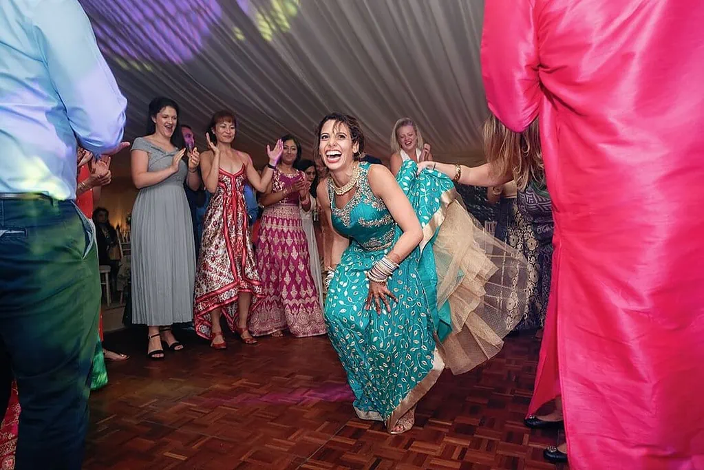 bride dancing at the indian wedding