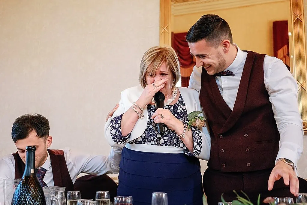 emotional mother of the groom during her speech