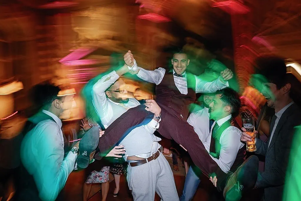 groom having fun on the dance floor