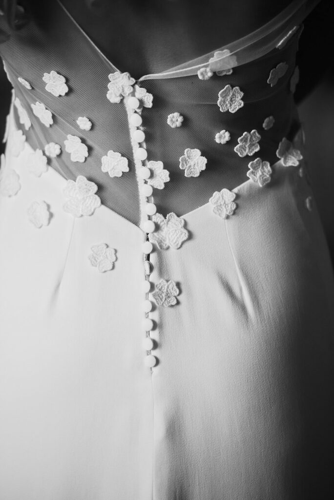 back of the bride's dress at Pennyhill Park