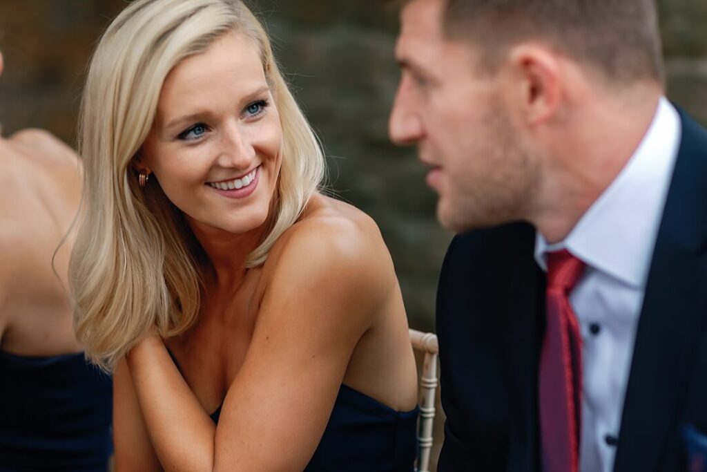 guests chatting before the wedding ceremony at Pennyhill Park
