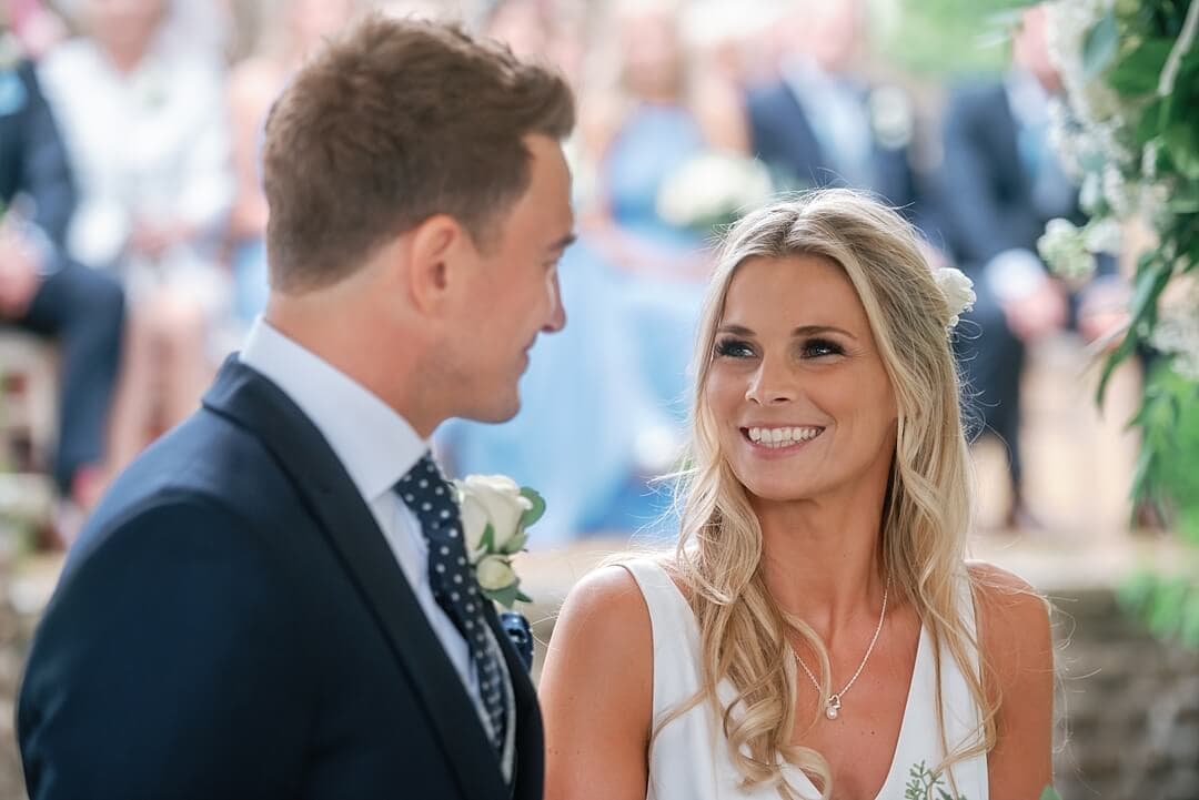 happy couple during the wedding ceremony at Pennyhill Park