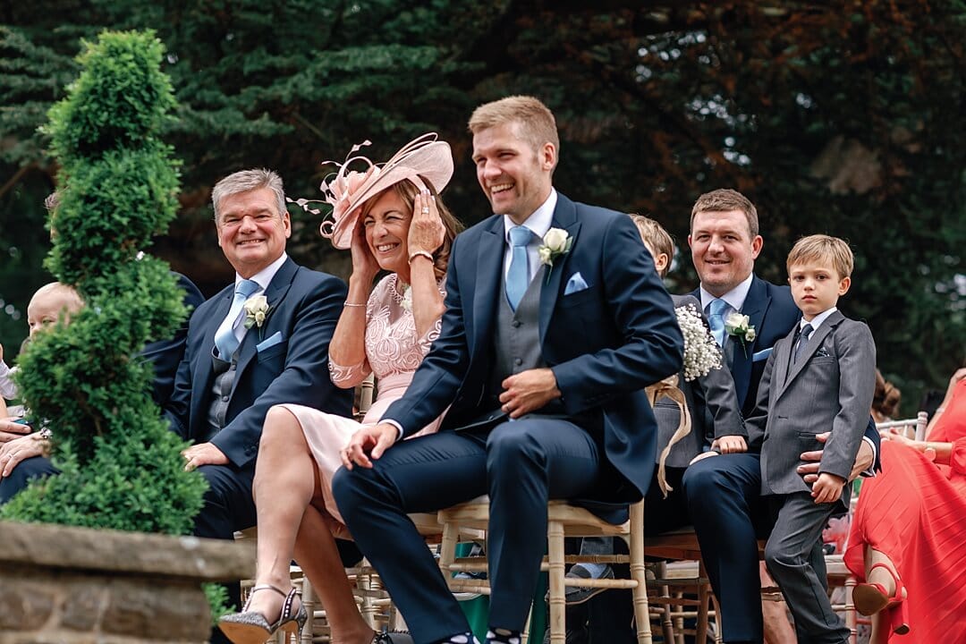 groom's parents reactions during the wedding ceremony