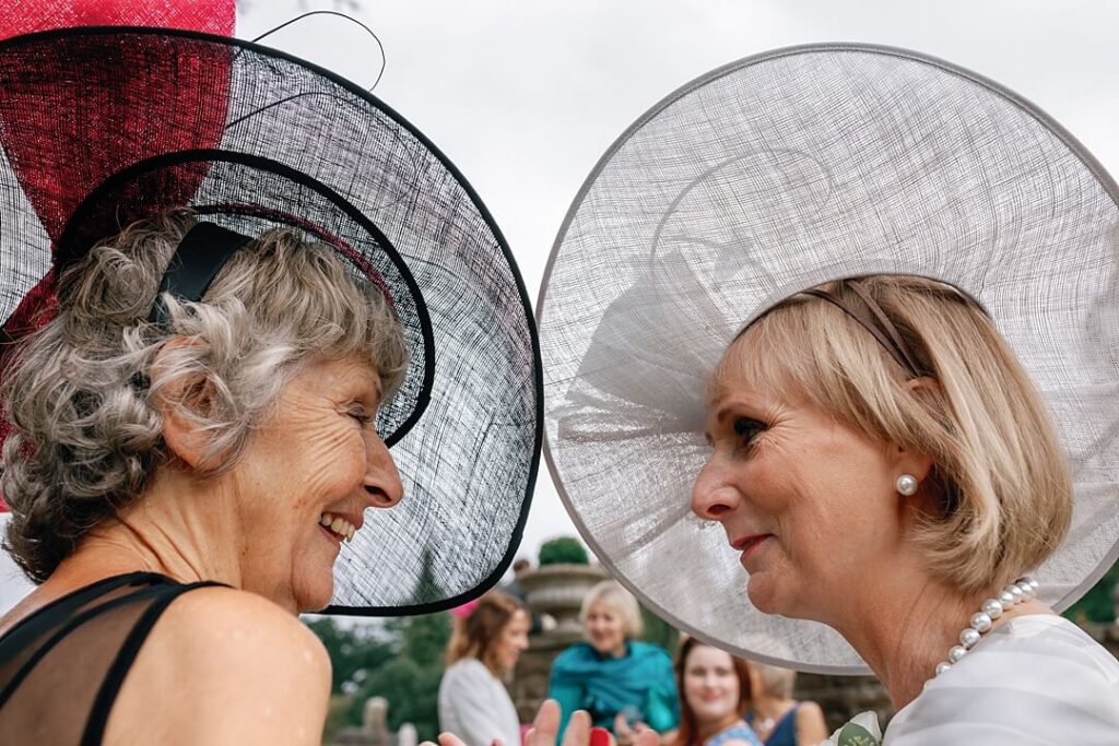 two mum's chatting at the wedding