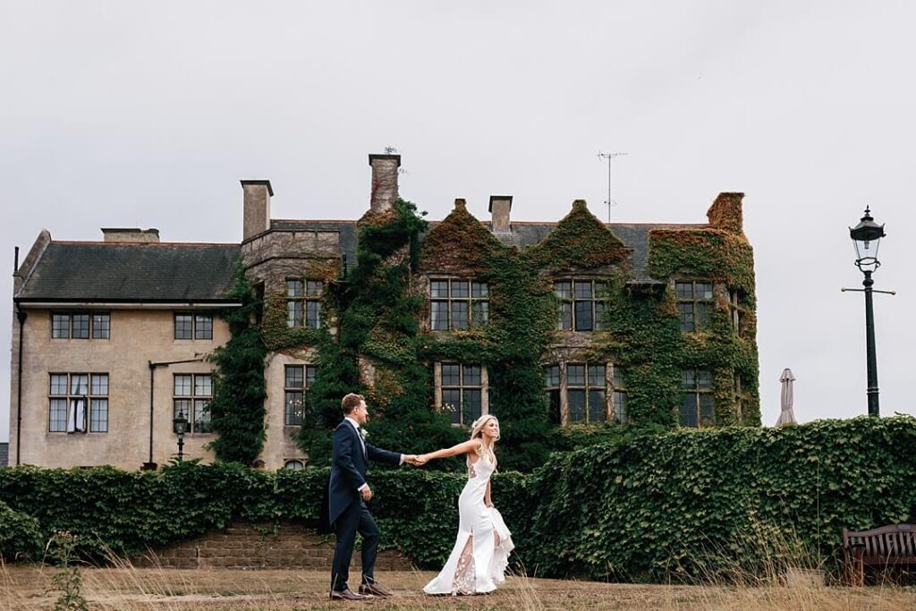 Couple Portraits in front of the house at Pennyhill Park