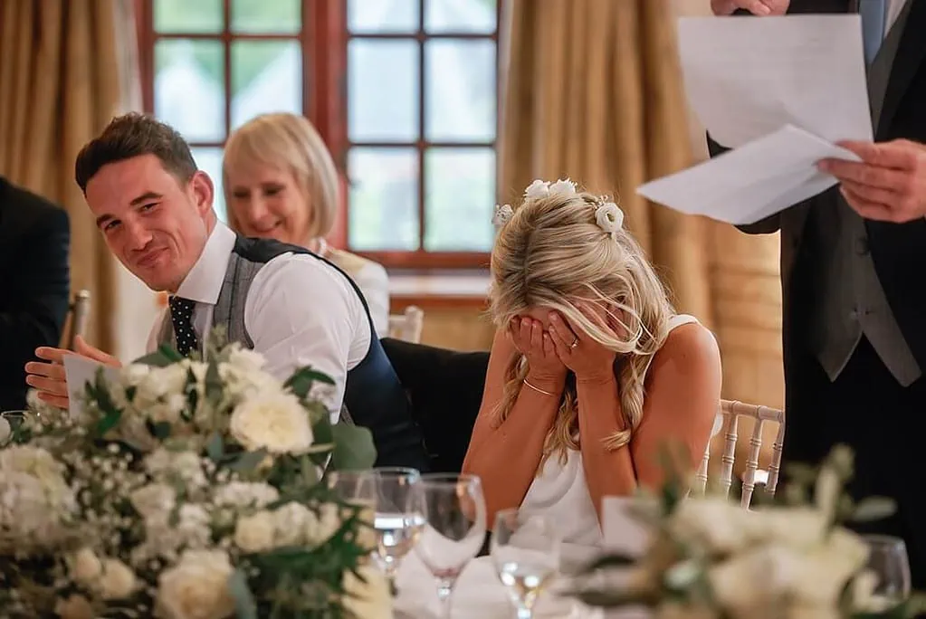 bride's reaction during the speeches at Pennyhill Park