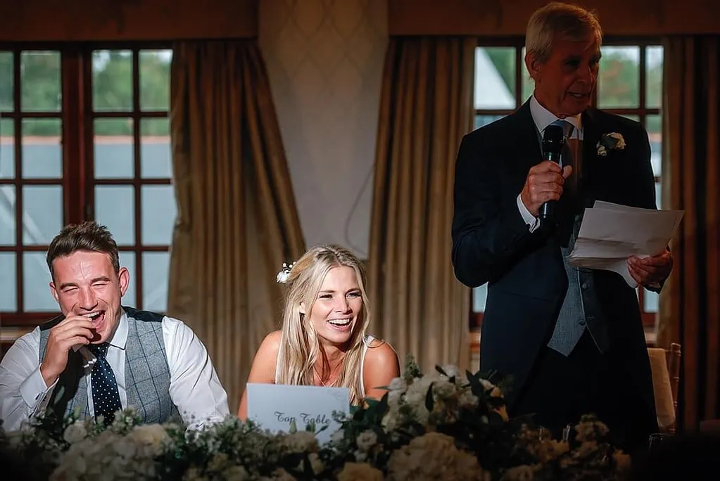 couple's reaction during the father of the bride speech