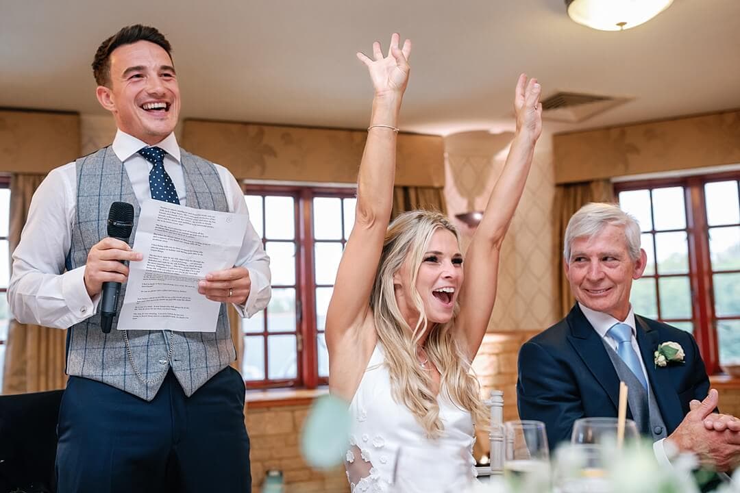 happy bride during the speeches at Pennyhill Park