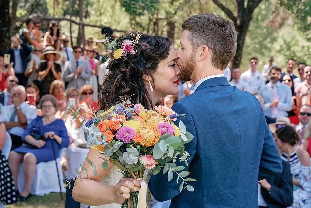 groom kissing the emotional bride in Navaluenga, Spain