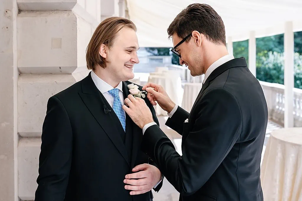 groom and best man getting ready