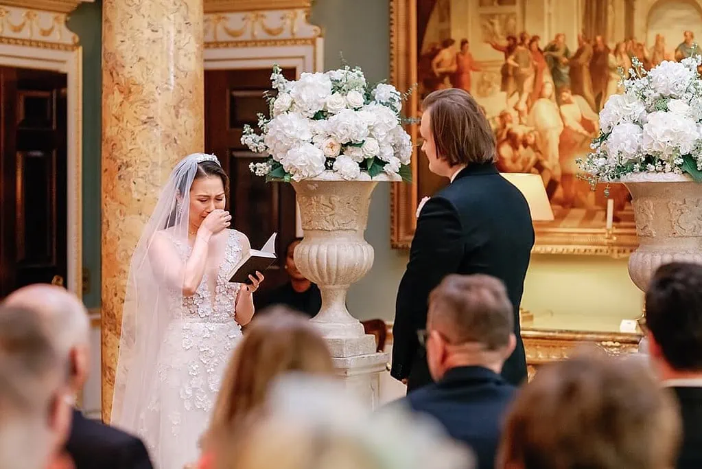 emotional bride reading her vows