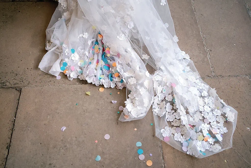 confetti on the bride's dress