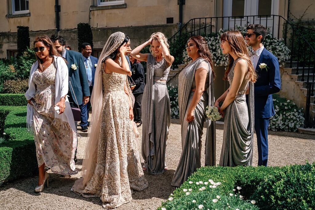 emotional bride and bridesmaids after the wedding ceremony in Syon Park