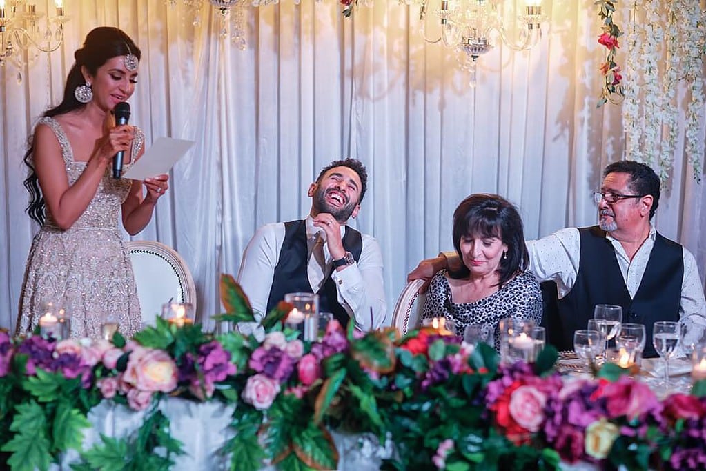 groom laughing during the bride's speech at Hilton London Syon Park