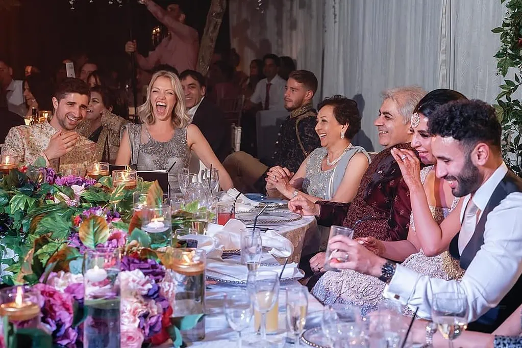 Laughter during the speeches at Syon Park Wedding Photographer