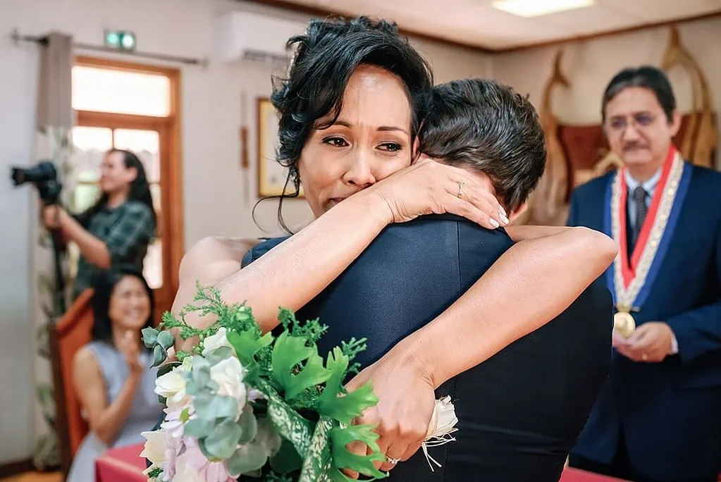 tearful bride hugging the groom Tahiti Wedding Photographer