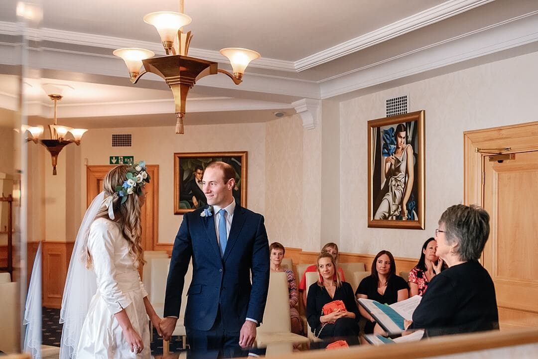 mirror reflection of the wedding at Wandsworth Town Hall