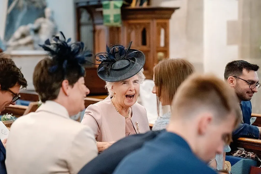 laughing grandmother in church