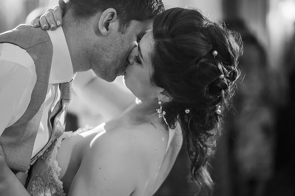 kissing during the first dance at RAC Woodcote Park