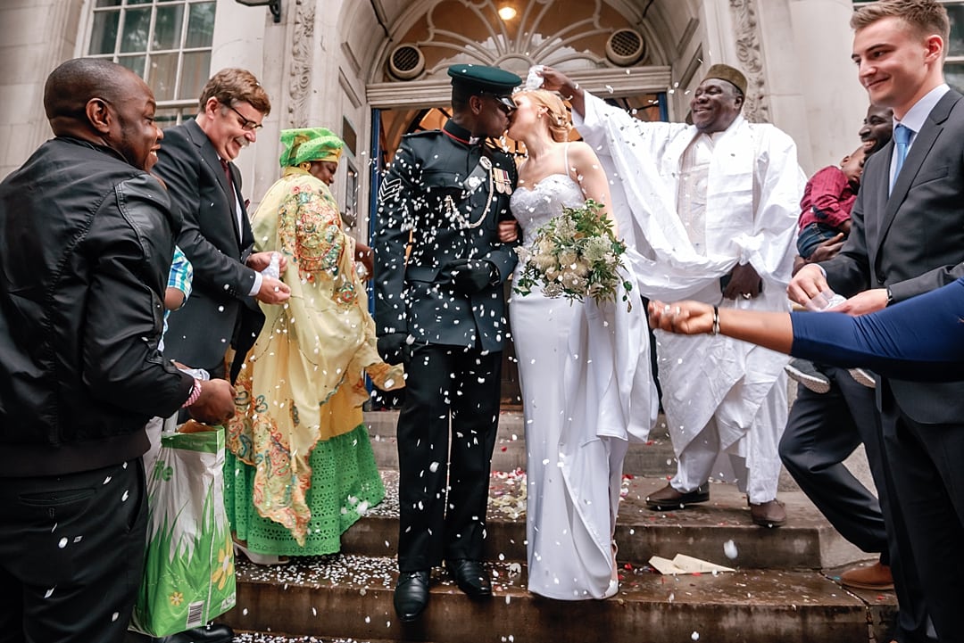 the kiss at the confetti at Chelsea Old Town Hall