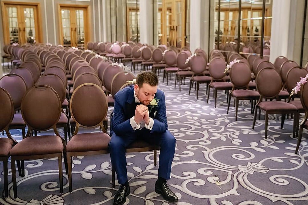 the groom waiting for the wedding ceremony at The Corinthia Hotel