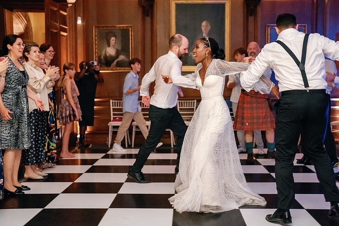 bride and groom ceilidh at cowdray house