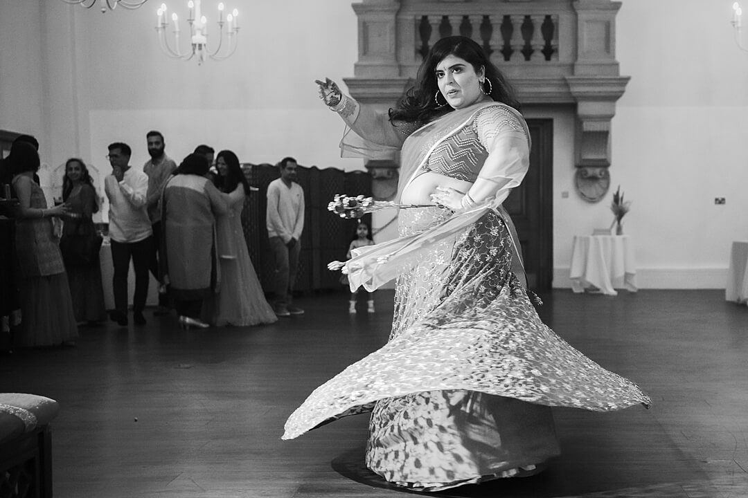A dance during The Sangeet at Heythrop Park Resort