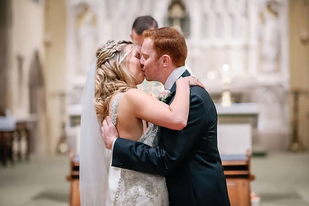 the first kiss at the end of the wedding ceremony