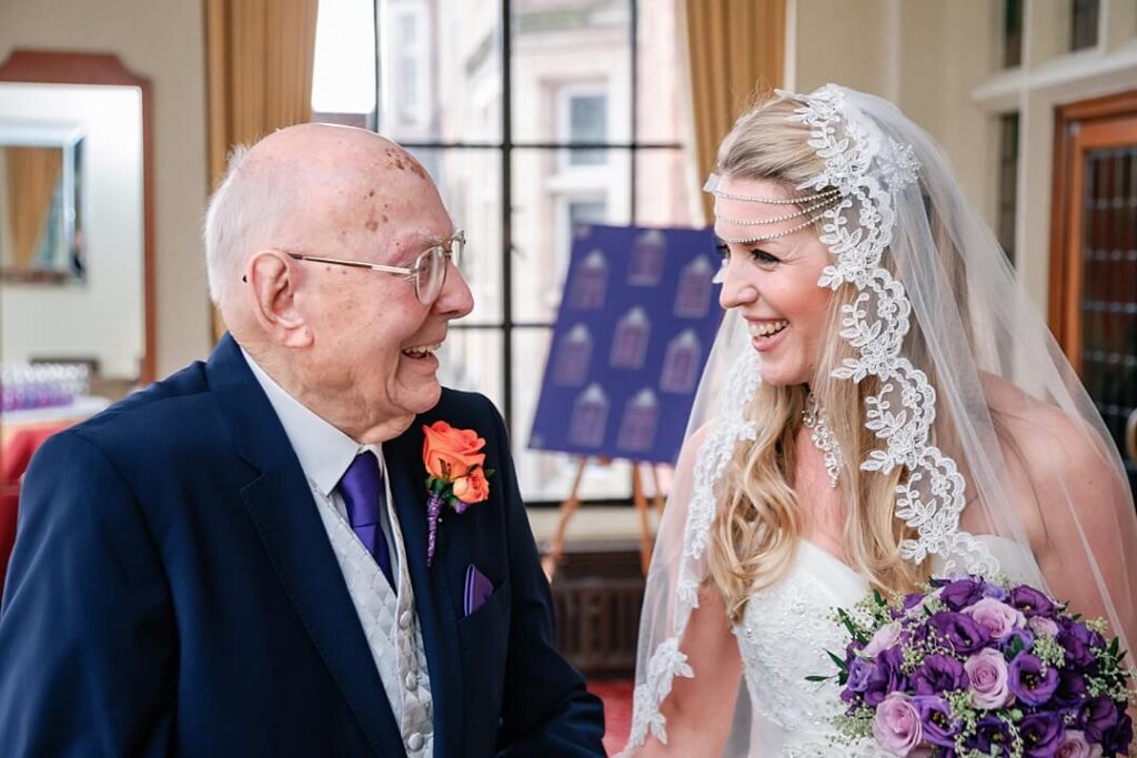 bride and her grandfather entering the wedding
