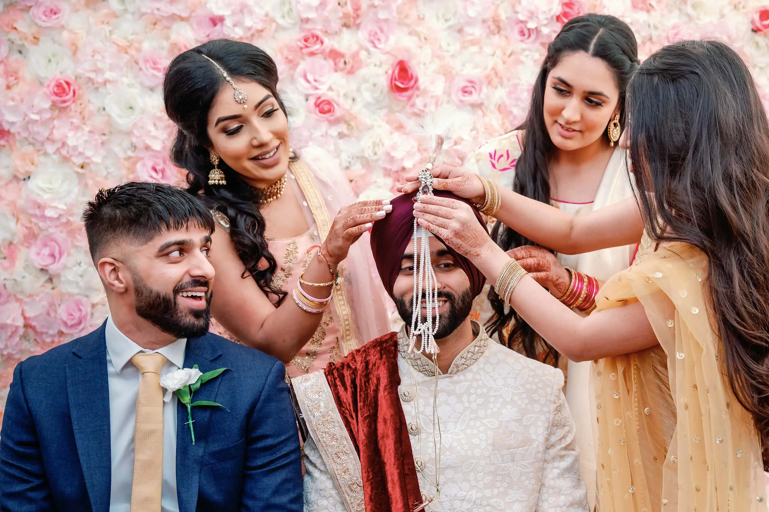 Sister's attaching the Kalgi Punjabi wedding